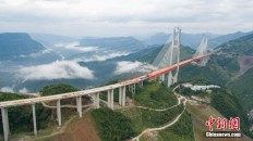 Main span of highest bridge completed in SW China