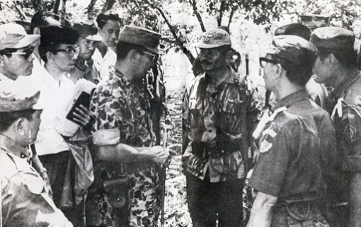 A dark history -- Maj. Gen. Soeharto briefs members of the Army’s Special Forces (RPKAD, now Kopassus) prior to the removal of the bodies of the Army generals who were murdered during an alleged coup attempt on Sept. 30, 1965, which was blamed on the now defunct Indonesian Communist Party (PKI). As the most senior military officer at the time, Soeharto led all the operations to restore security and impose order in the aftermath of the alleged attempt.