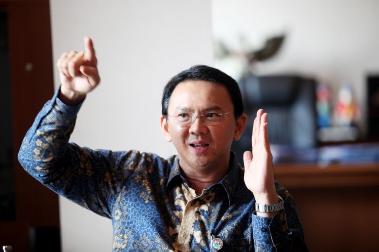 Ahok denies he insulted the Quran 