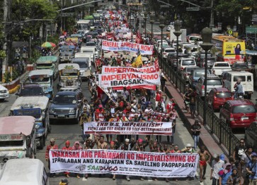 Filipino protesters want police in brutal dispersal punished 