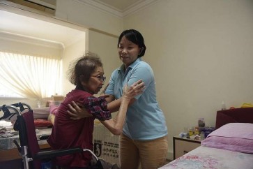 Elderly sick in Singapore turn to foreign, live-in caregivers