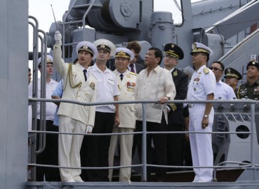 Philippines' Duterte tours Russian warship amid warming ties