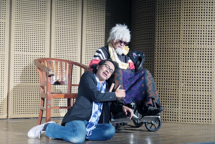 Father and son: Playright Putu Wijaya (right) performs with his son, Taksu Wijaya, in the Oh stage play.