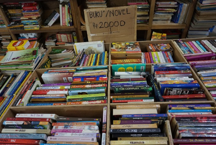 A secondhand book seller at Blok M Square, South Jakarta.