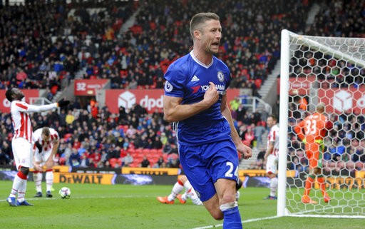 EPL leader Chelsea beats Stoke 2-1 through late Cahill goal