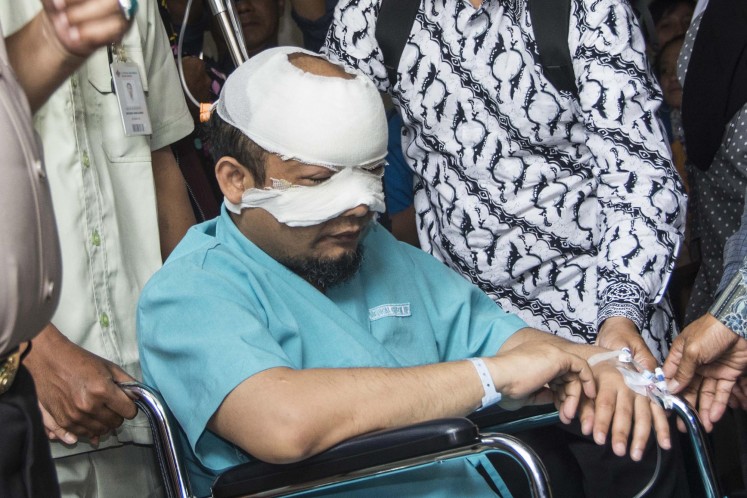 Novel Baswedan receives treatment at a hospital in Jakarta after suffering burns to his left eye, face and neck. 