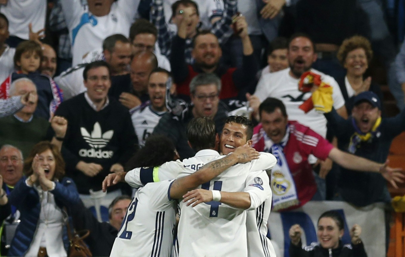 Ronaldo hat trick puts Madrid into Champions League semis