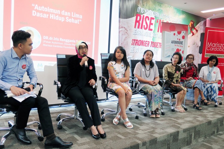 Health talks: News anchor Jason Sambouw, (left to right) autoimmunity survivors Iris Rengganis, Anisa Fikanolanda and her mother Novi Ferdiansyah, Yonita Chandra, Yennel Suzia and Lilik Sudarwati talk about autoimmunity in Jakarta.