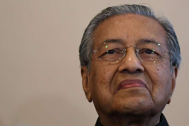 Malaysia's Mahathir quizzed as political tensions rise