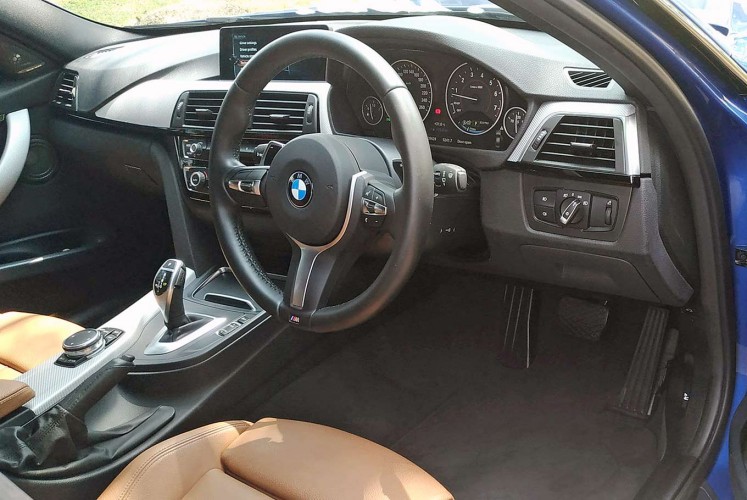 Spacious: The driver’s side of the BMW 330i M Sport.