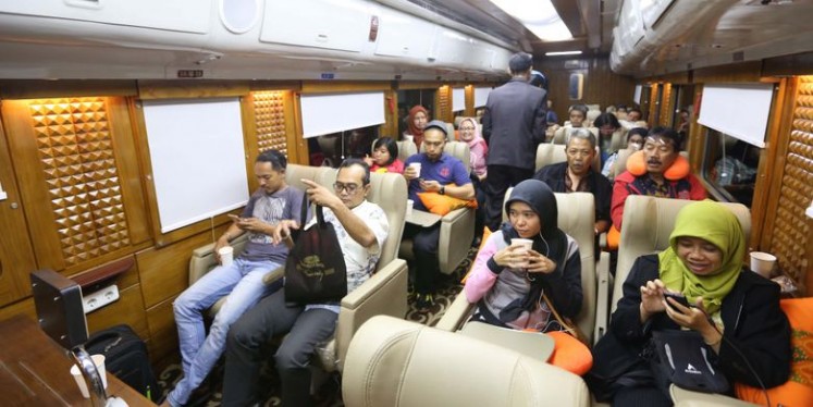 The passengers of a Priority car during a train trip to Yogyakarta on Aug. 4, 2017.