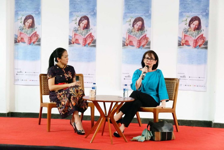 Modern thoughts: Karlina Supelli (right) talks with moderator Rike Amru in a discussion during the recent ASEAN Literary Festival in Kota Tua, West Jakarta.