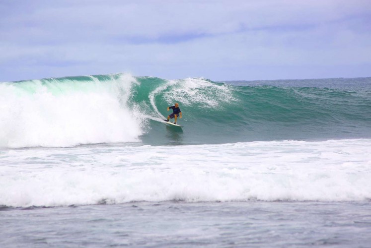 The reef break at Tanjung Layar makes Sawarna a surfer’s paradise.