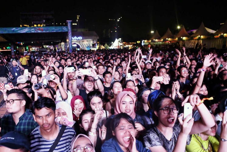 Good times: Thousands of music fans gather for the We The Fest event.