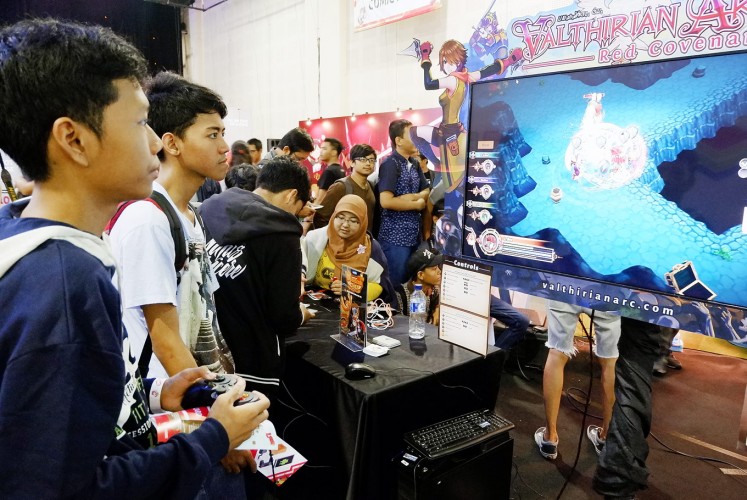 New attractions: Agate’s games attract youngsters during Bekraf Game Prime 2017.