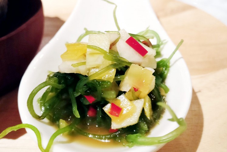 New twist: Balinese fresh seaweed salad is sprinkled with tiny mango cubes dressed with fish brine stock.