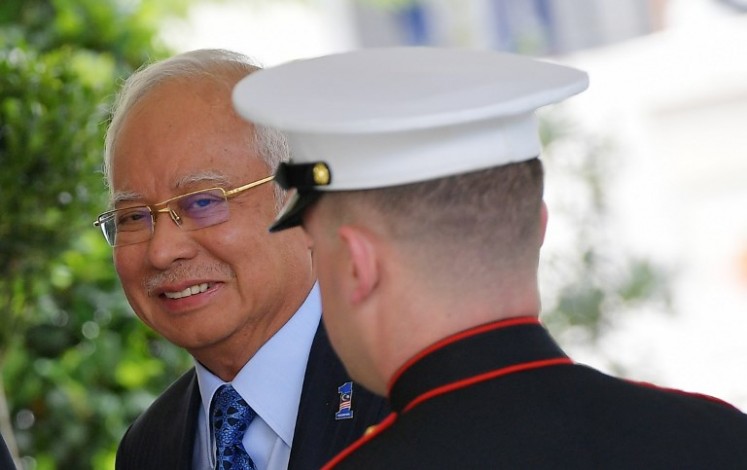 Malaysian Prime Minister Najib Razak arrives outside of the West Wing ahead of meetings with US President Donald Trump at the White House on Sept. 12, 2017 in Washington, DC. 