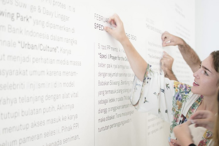 An visitor attends the opening of the Unsung Museum at ROH Projects, Jakarta.