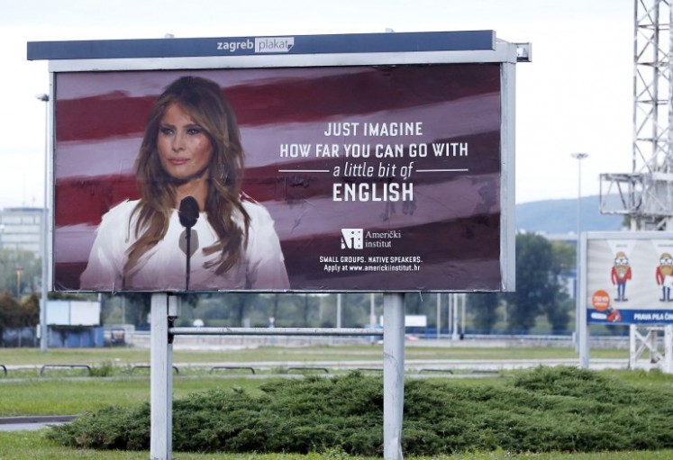 A billboard advertisment for the American Institute school in Zagreb featuring an image of the US First Lady Melania Trump with a caption that reads, 