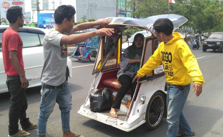 Asking for support: Drivers of motor-powered tricycles, or 