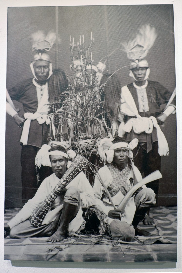 Pride: An old photo depicting Bandanese people wearing Cakalele war dance costumes.