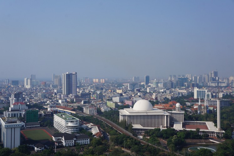 Istiqlal Mosque (right) viewed from the peak of the National Monument (Monas) on Thursday, September 14, 2017.