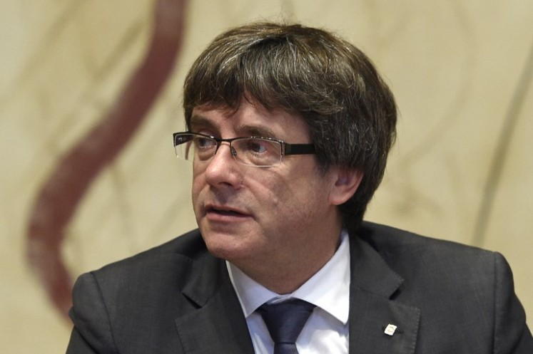 Catalan president Carles Puigdemont attends a Catalan government meeting at the Generalitat in Barcelona, on Oct. 2, 2017. Catalonia's leader Carles Puigdemont said the region had won the right to break away from Spain after 90 percent of voters taking part in a banned referendum voted for independence, defying a sometimes violent police crackdown and fierce opposition from Madrid.