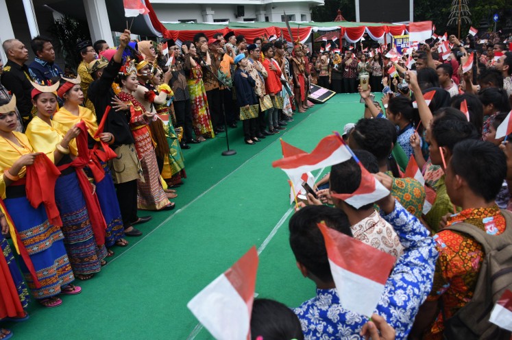 Hundreds of students wearing Batik attend the celebration of the National Batik Day at the Malang City Hall in East Java on Monday, Oct 2, 2017. The event was aimed at promoting Batik as a symbol of the nation's diversity and tolerance. 