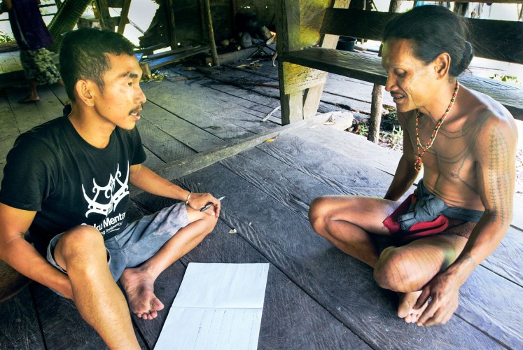 August Tonggiat Sikatsila meeting with Sikerei, Aman Manja to conduct research for their Indigenous education program. 