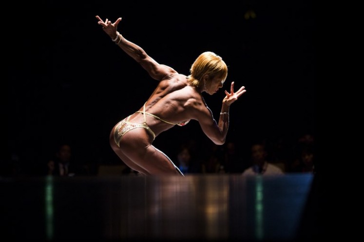 In this picture taken on Oct. 9, 2017, Japanese bodybuilder Satoko Yamanouchi poses during the Japan bodybuilding championships in Tokyo. The number of bodybuilders registered with Japan's national federation has almost doubled over the past six years to around 3,000, with women making up 10 percent as part of a nationwide fitness boom, officials said. In ageing Japan, female bodybuilding is dominated by women in their forties and fifties, as many usually only start after their children have grown up.