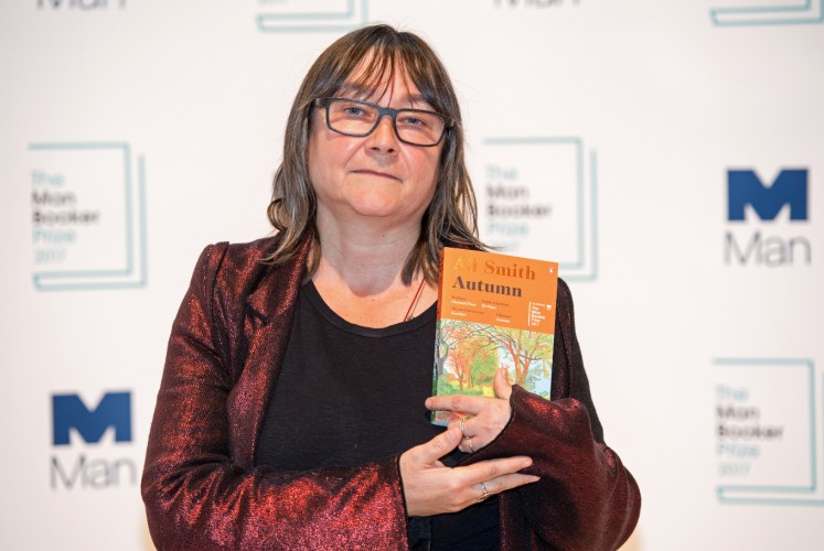 British author Ali Smith holds her book 'Autumn' during a photocall at the Royal Festival Hall in London on October 16, 2017, ahead of tomorrow's announcement of the winner of the 2017 Man Booker Prize for Fiction. 