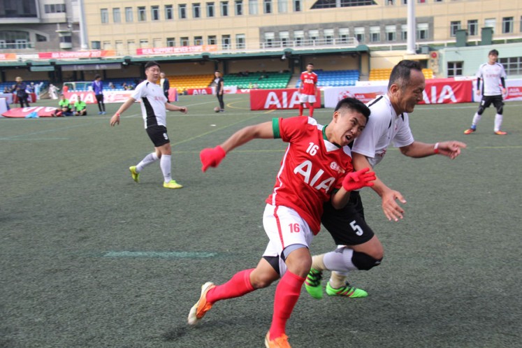 Kusuma Manggala, a player on AIA Indonesia’s Sadawa team, pits his skills against an opposing player during the AIA Championship regionals in Hong Kong.