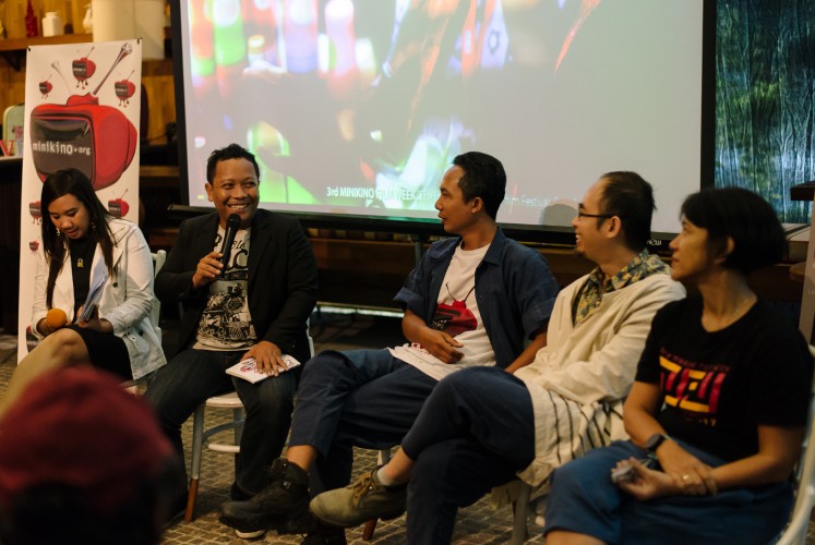 (From second left to right) one of the judges of the third Minikino Film Week Daniel Rudi Haryanto, the festival's executive director I Made Suarbawa, the festival director Edo Wulia and advisory board member Ursula Tumiwa at a press conference promoting the road show in Jakarta on Monday, Oct. 23, 2017..
