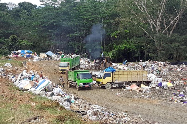 Trucks dump rubbish at the Puuwatu landfill site. The 18ha site currently boasts a composting station and even a flying-fox facility for adrenaline junkies. The government plans to develop part of it into a green zone for recreational activities and an off-road biking track. 