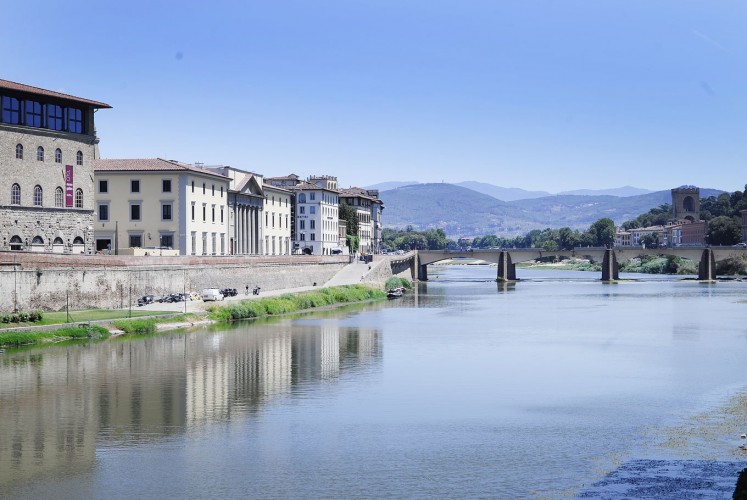 Serenity: The Ponte Vecchio, an arch bridge in Florence, Italy, stretches across the Arno River.