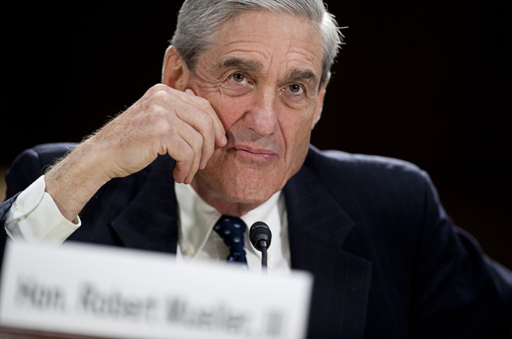 This file photo taken on June 19, 2013 shows then Federal Bureau of Investigation (FBI) Director Robert Mueller testifying before the US Senate Judiciary Committee on oversight during a hearing on Capitol Hill in Washington, DC. Special counsels like the one named to oversee the probe into Russia's alleged election interference are rare super sleuths with more power and independence than regular US investigators. This time it is Robert Mueller, a former FBI director who took over the high-stakes Russia probe in May after US President Donald Trump fired James Comey as FBI director. The first indictments in Mueller's probe are reported to have been brought by a grand jury and could be made public as early as Oct. 30.
