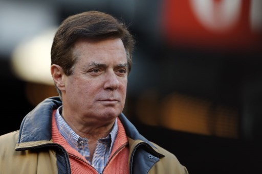 This file photo taken on October 16, 2017 shows former Donald Trump presidential campaign manager Paul Manafort during Game Four of the American League Championship Series at Yankee Stadium in the Bronx borough of New York City. 