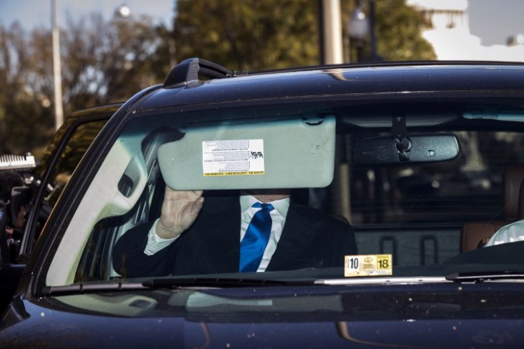 Former Trump campaign chairman Paul Manafort gets into his car after leaving federal court, Oct. 30, 2017 in Washington, DC. Paul Manafort and Rick Gates, have been indicted by a federal grand jury in the investigation into Russian meddling in the U.S. election. 