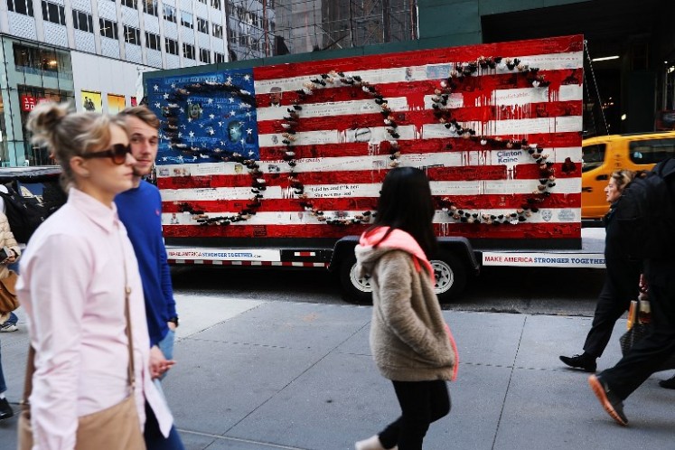 A rolling art installation commenting on the state of politics in America sits in the road in Manhattan on Nov. 2, 2016 in New York City. With the US presidential election only days away, many Americans are feeling anxious over both the tone and the direction of the campaign for the presidency. The race between Hillary Clinton and Donald Trump has been tightening in crucial swing states as Nov. 8 approaches. 