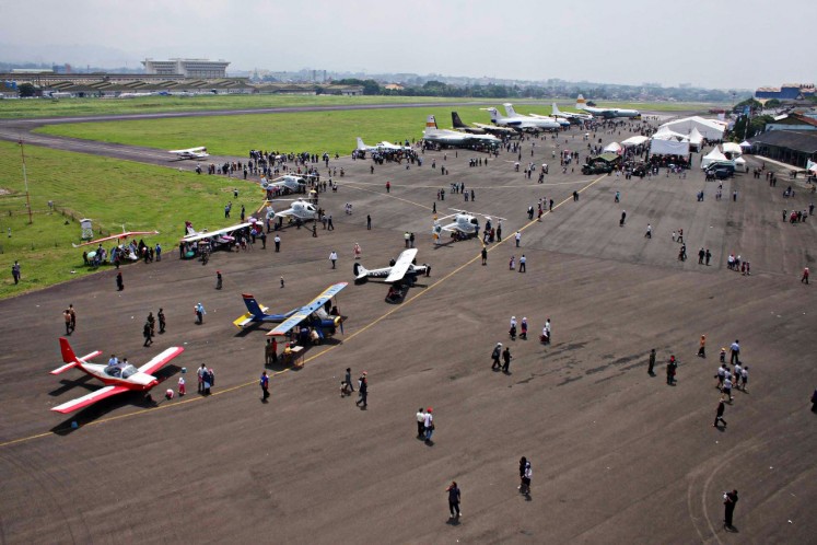 Public attraction: Visitors pack Husein Sastranegara Air Force Base, Bandung, West Java, to watch various aircraft on display at the 2010 Bandung Air Show. 