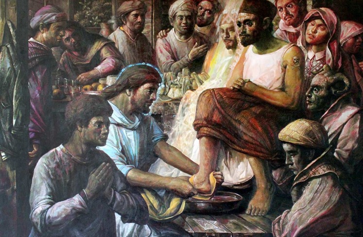Jesus washes a disciple's feet by Slamet Hendro Kusumo