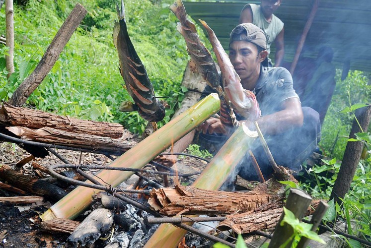 Cook it fresh: Fish is roasted and cooked in bamboo tubes called pansuh, with forest leaves as flavoring.