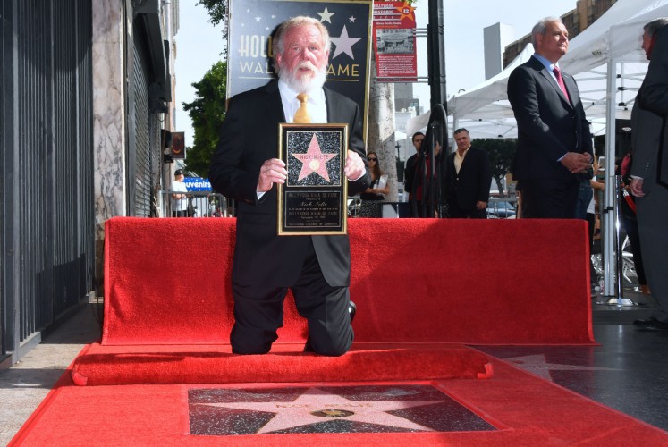 Actor Nick Nolte poses on his Hollywood Walk of Fame Star after it was unveiled in Hollywood, California, on November 20, 2017. Nolte was the recipient of the 2,623rd star in the category of Motion Pictures.