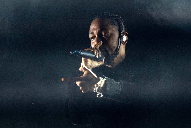 This file photo taken on April 16, 2017 shows US hip hop singer Kendrick Lamar performing at the Coachella Valley Music And Arts Festival in Indio, California. Jay-Z led Grammy nominations on November 28, 2017, with eight nods, followed closely by fellow rapper Kendrick Lamar with seven, in a striking embrace of hip-hop for the music industry's top prizes.