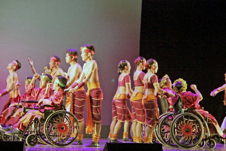 Roll with it: Performers from the Jakarta Disabled Children's Foundation (YPAC) join forces with EKI Dance Company for a powerful performance.