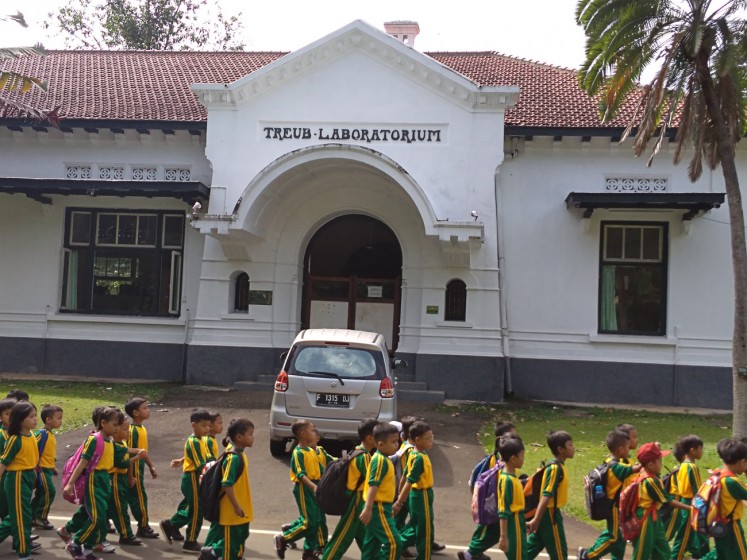 Learning center: School children leave the Treub laboratory at the Bogor Botanical Gardens after a visit, recently.