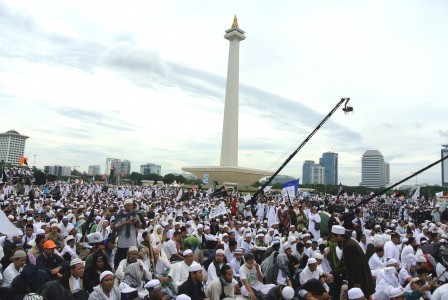 Participants of 212 reunion rally gather to pray and conduct religious activities in the Monas Park on Saturday, Dec. 2. They come Monas to commemorate the large-scale rally held last year seeking the imprisonment of former Jakarta Governor Basuki 