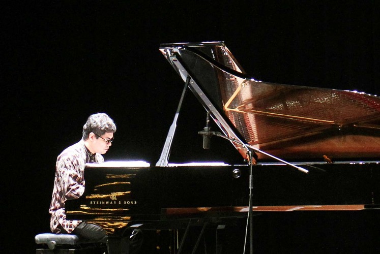 Fusion play: Indonesian pianist Ananda Sukarlan plays his composition 'I Wish Pavarotti Had Met Marzuki' during a recent tribute concert honoring legendary Italian opera singer Luciano Pavarotti.