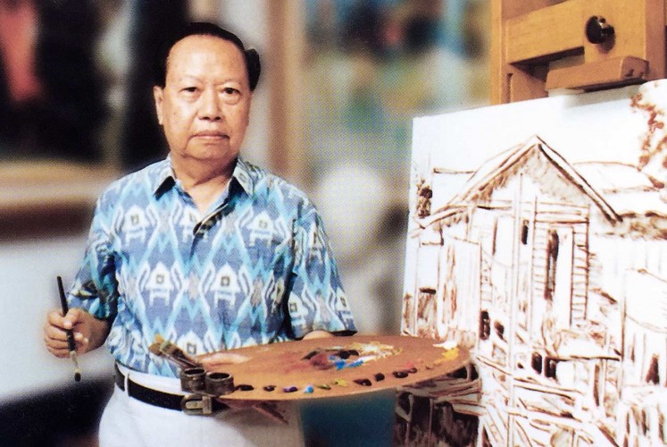 Art of survival: Lim Wasim, whose paintings graced the walls of the State Palace during founding president Sukarno’s era, poses with an early sketch of his painting.