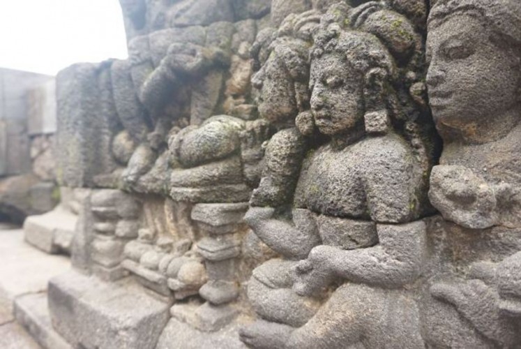 Reliefs along the walls of Borobudur Temple